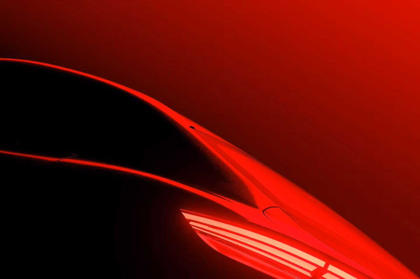Close-up of a sleek red car's rear with illuminated taillights against a red and black gradient background.